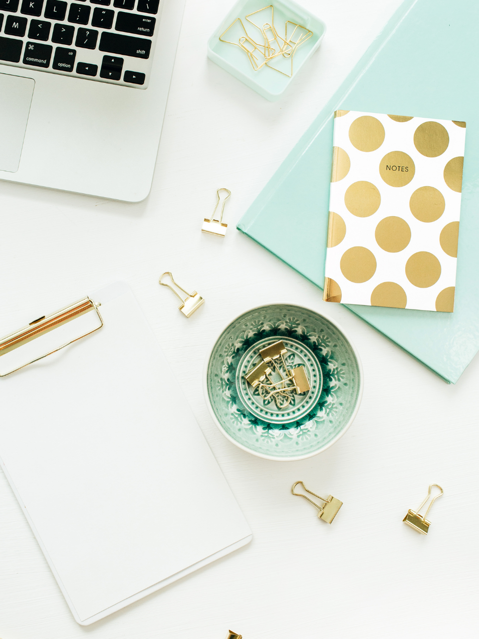 Using the internet to create a second stream of income. Laptop, cup and notepad flat lay.