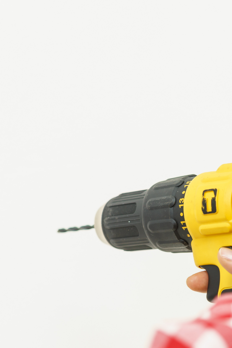 Drilling holes to hang a shelf