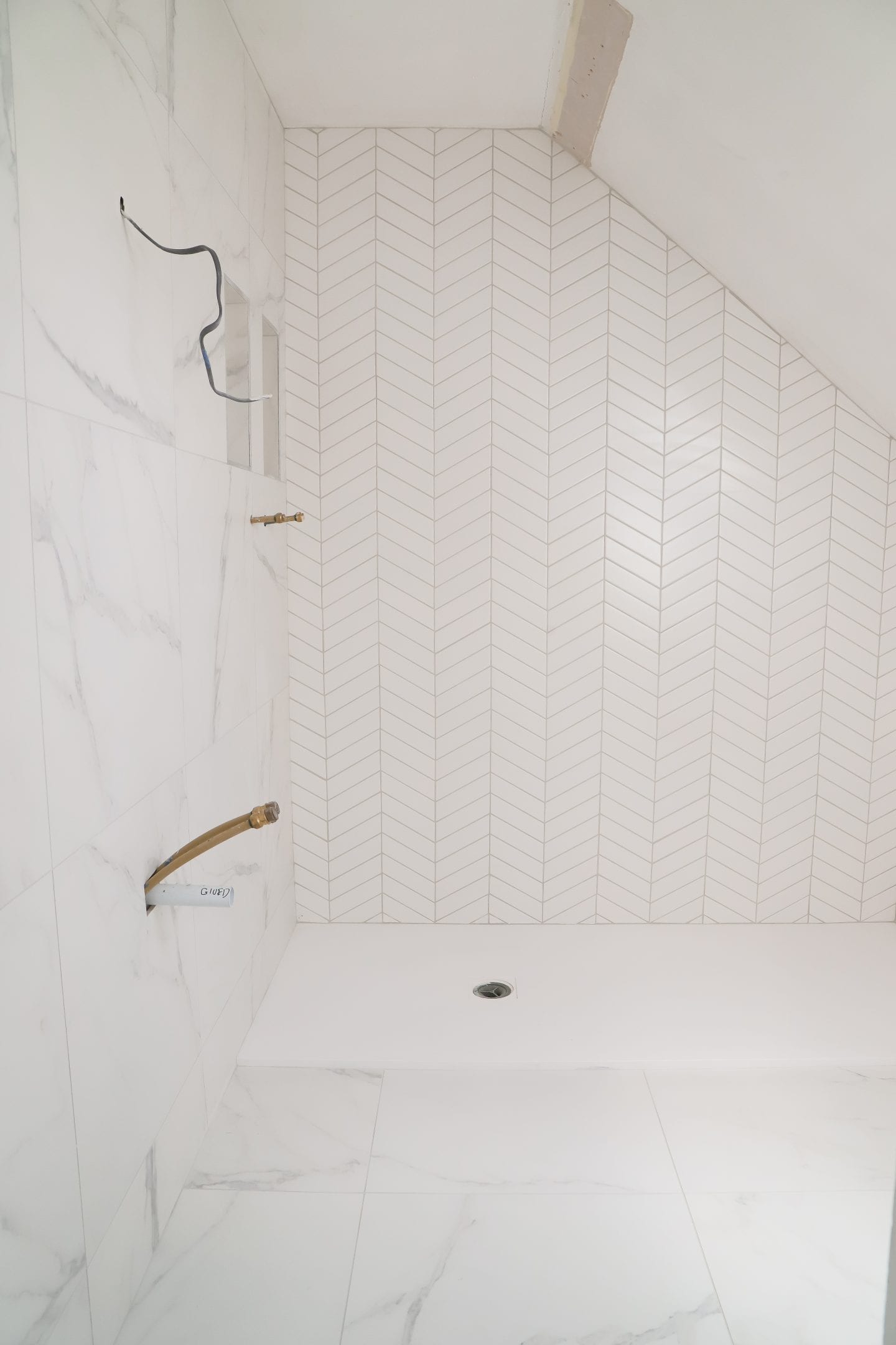 Chevron and marble tiles.