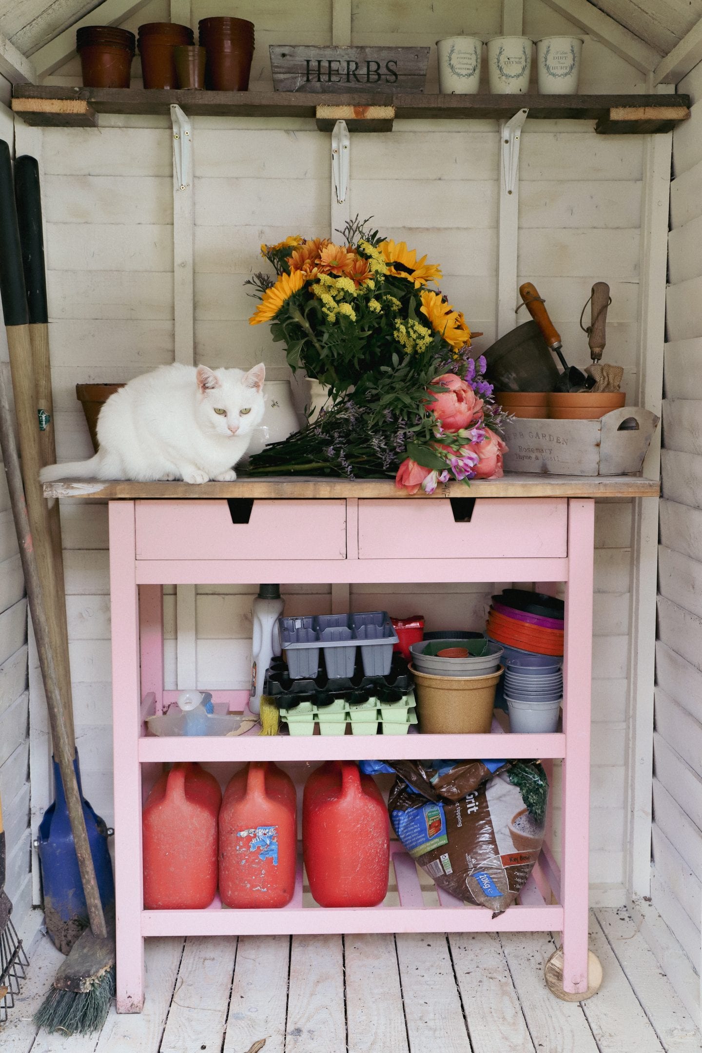Ikea kitchen cart used as a potting table. 