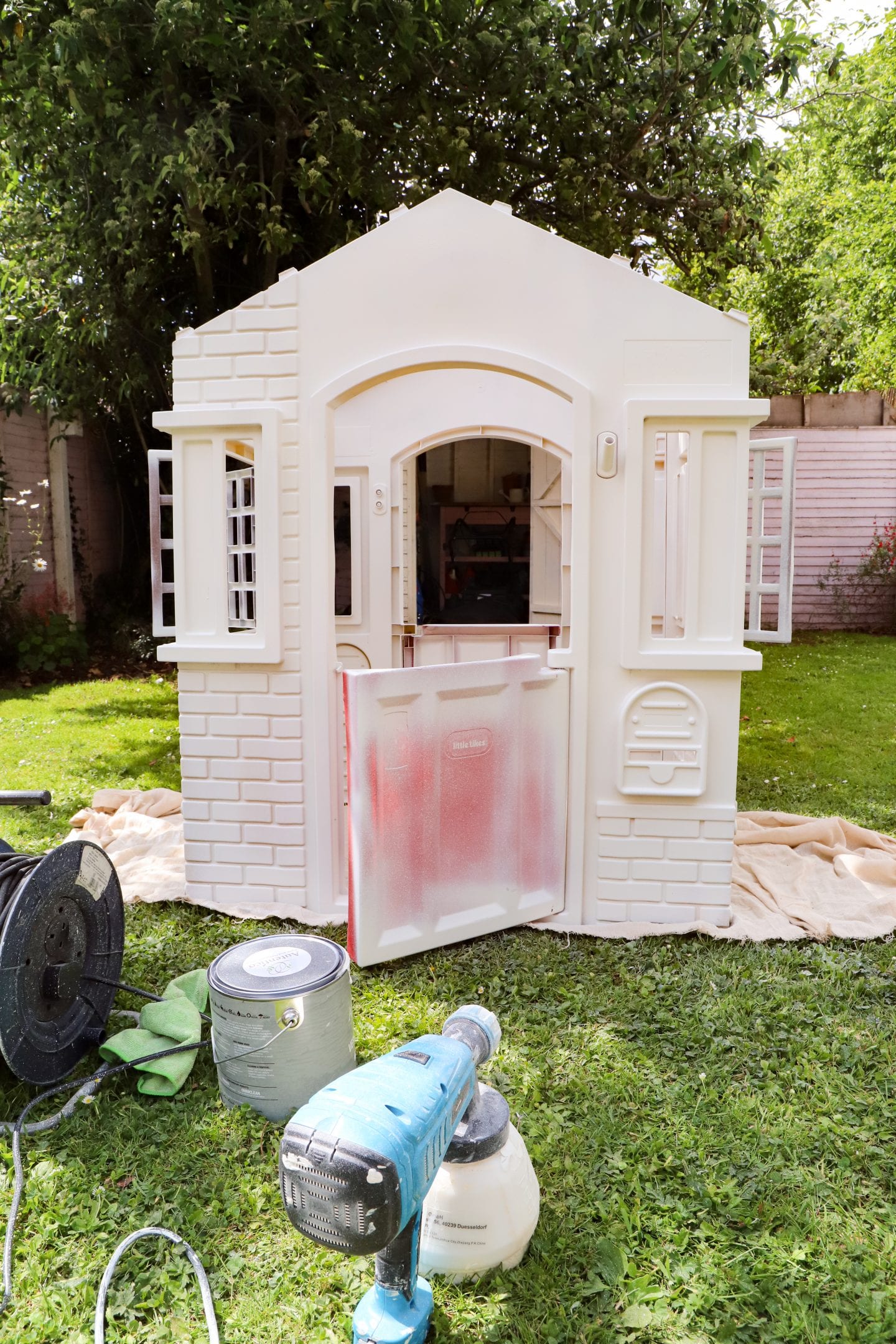 Plastic children's playhouse makeover.