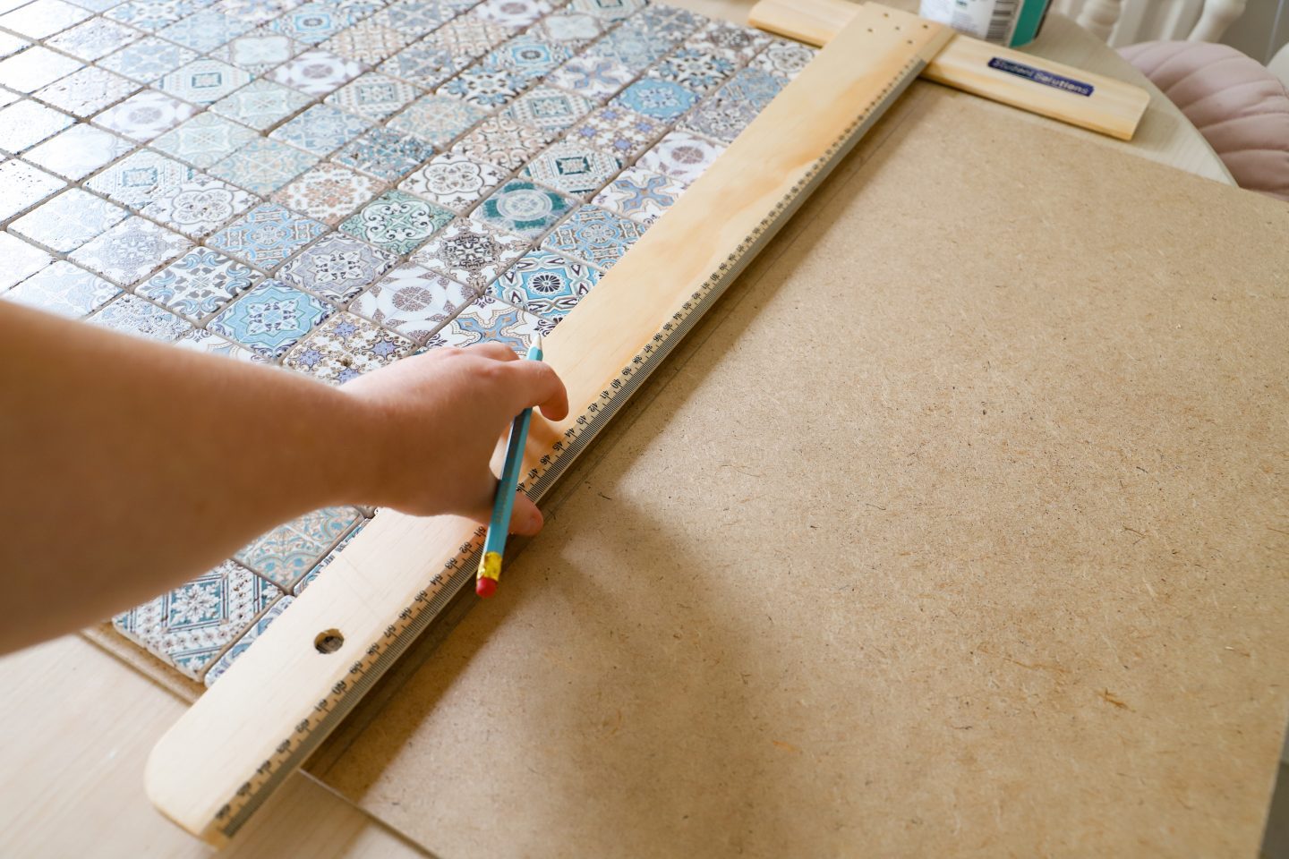 making a tiled table using Portuguese tiles. Ikea hack. Measuring the base.