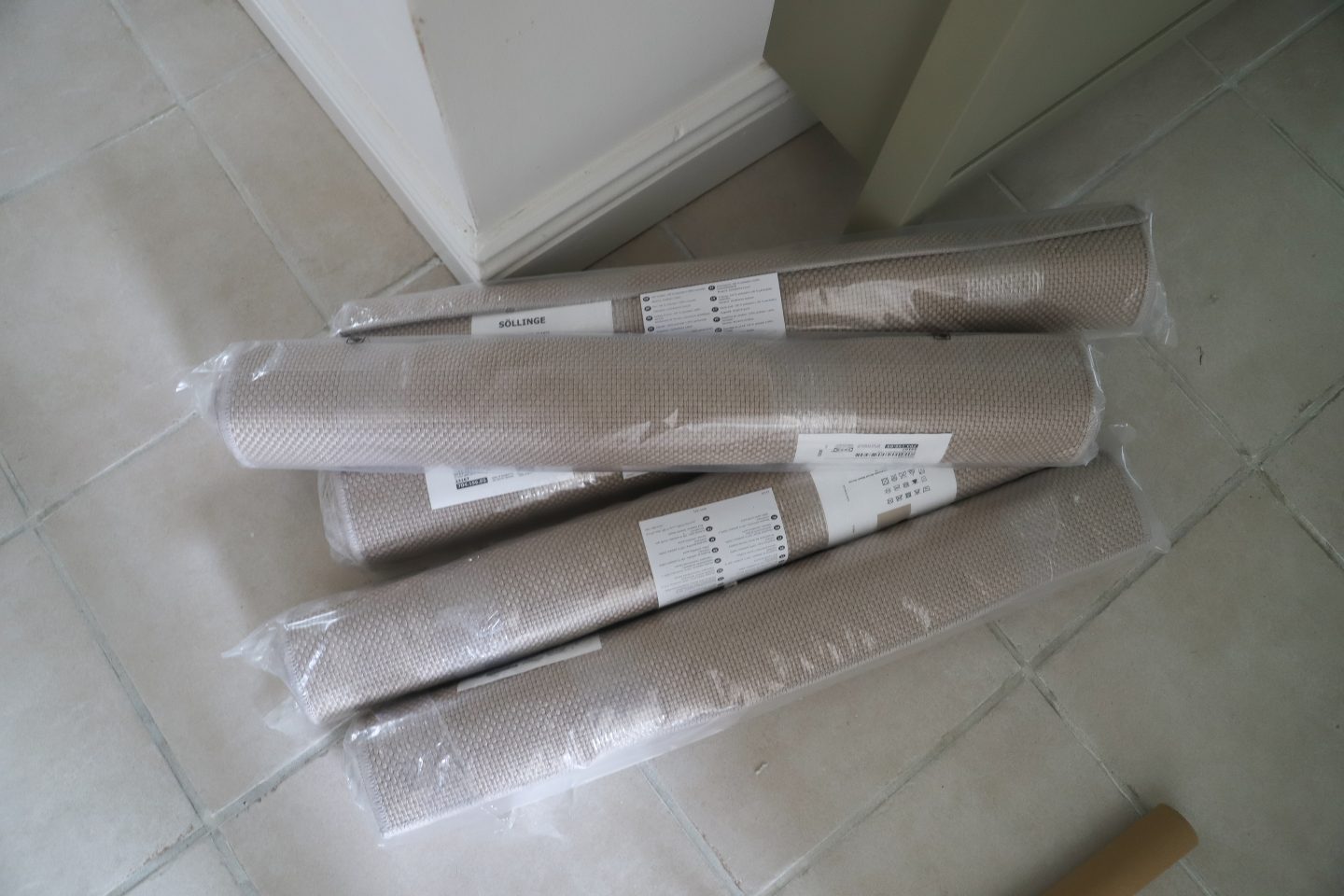 DIY stair makeover using Ikea SÖLLINGE rugs.