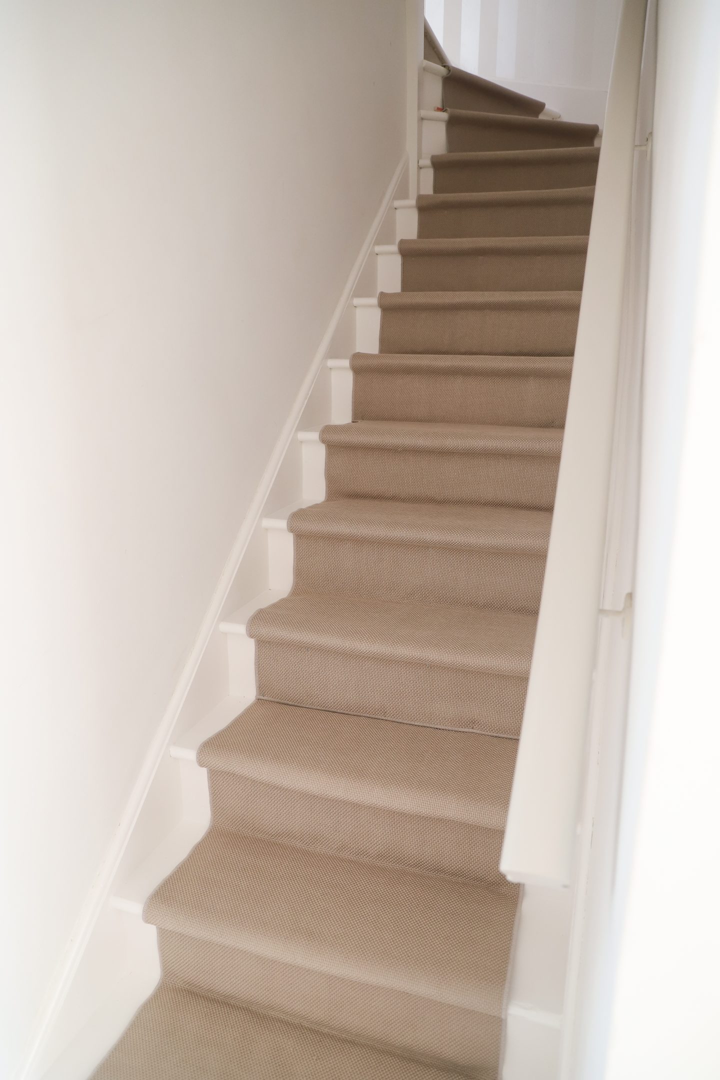 DIY stair makeover using Ikea SÖLLINGE rugs.