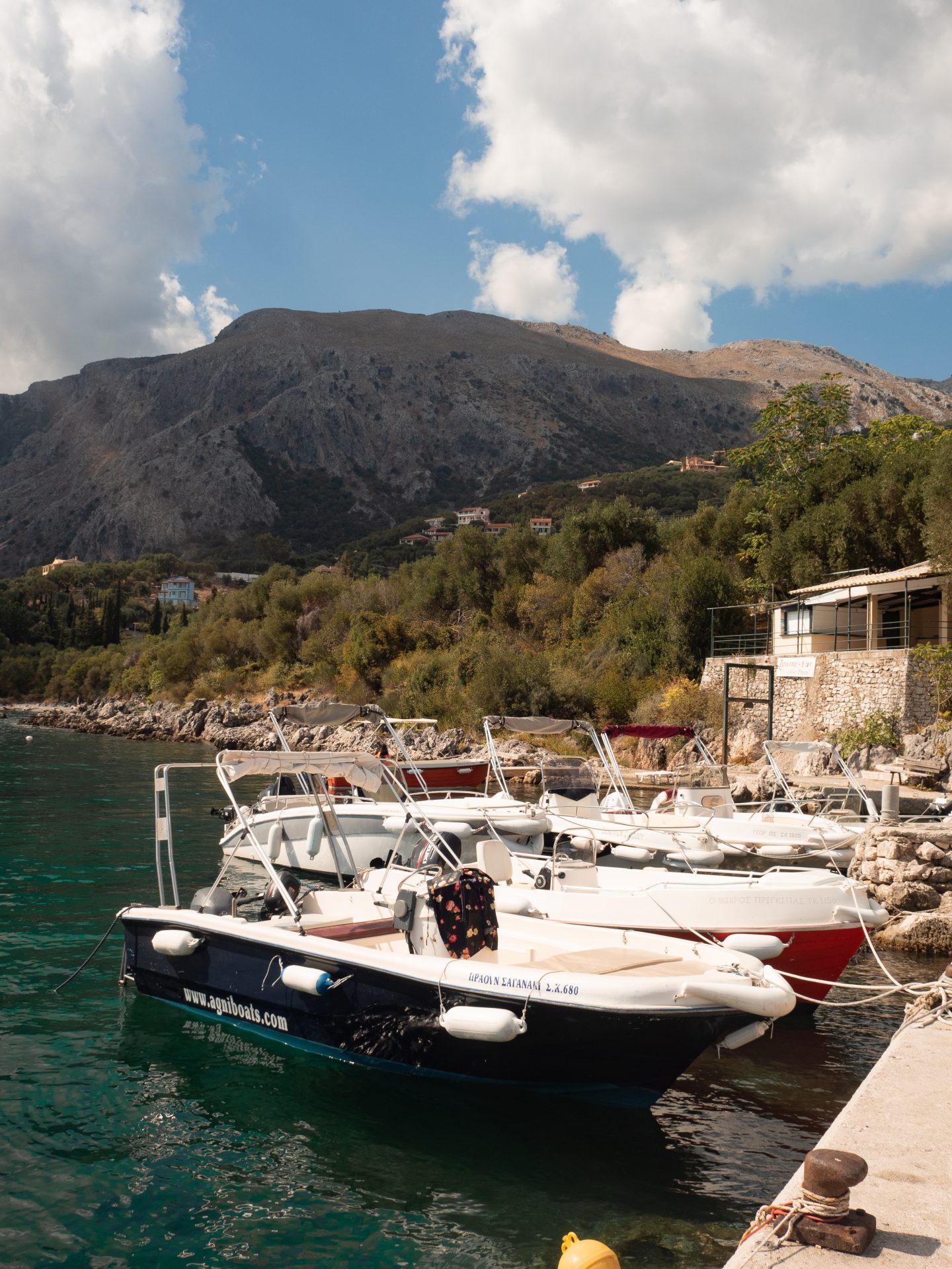 Corfu mountain and boat. 
