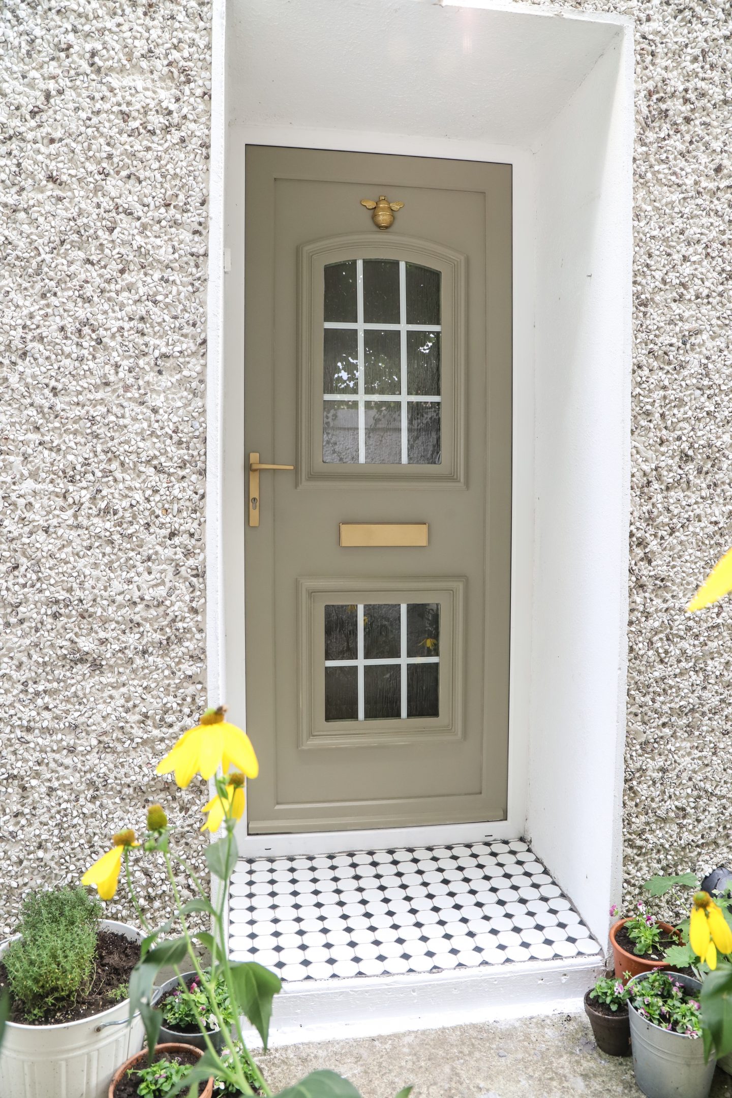 Painted green front door.
