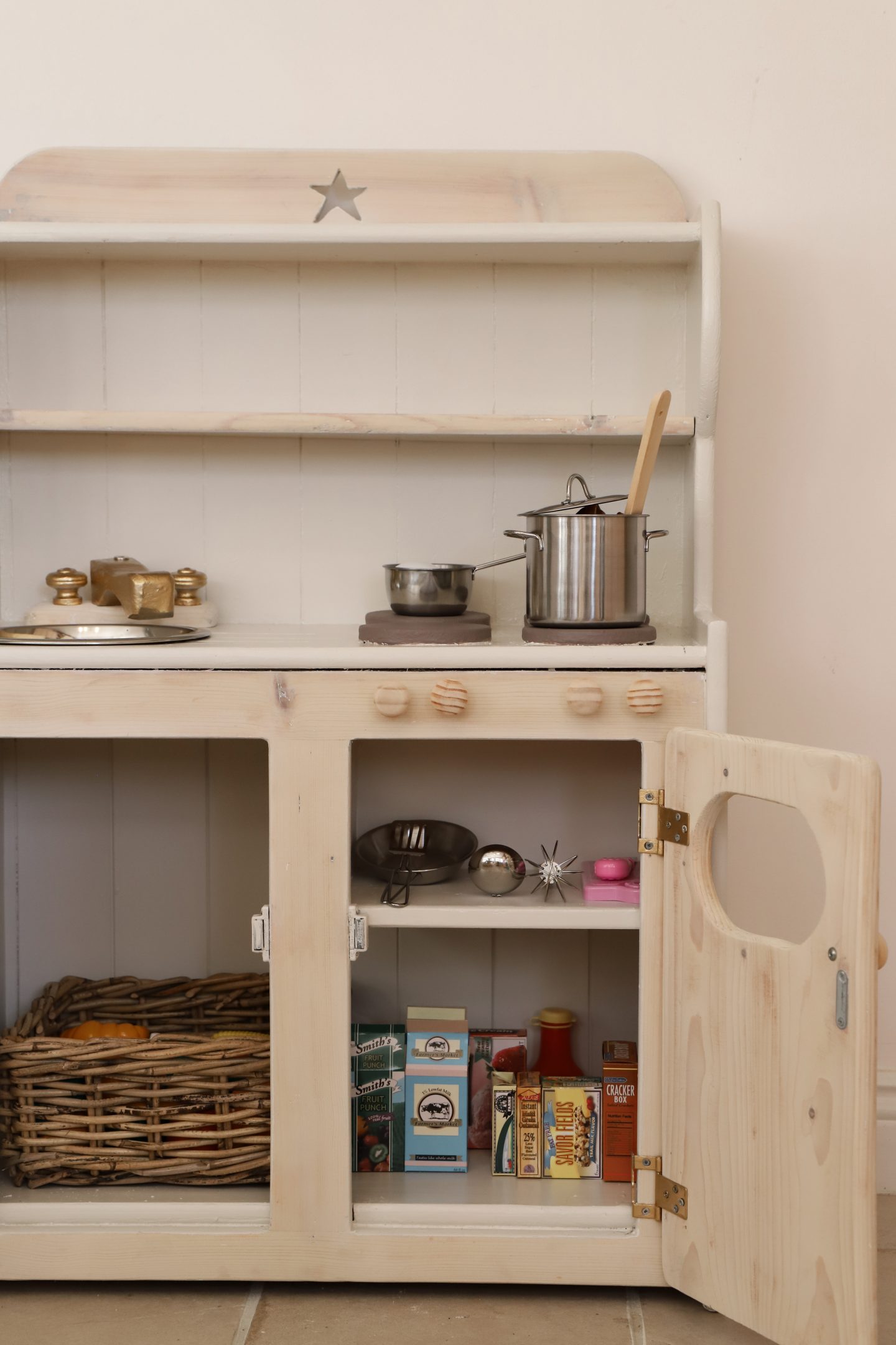 Light wooden kids kitchen.