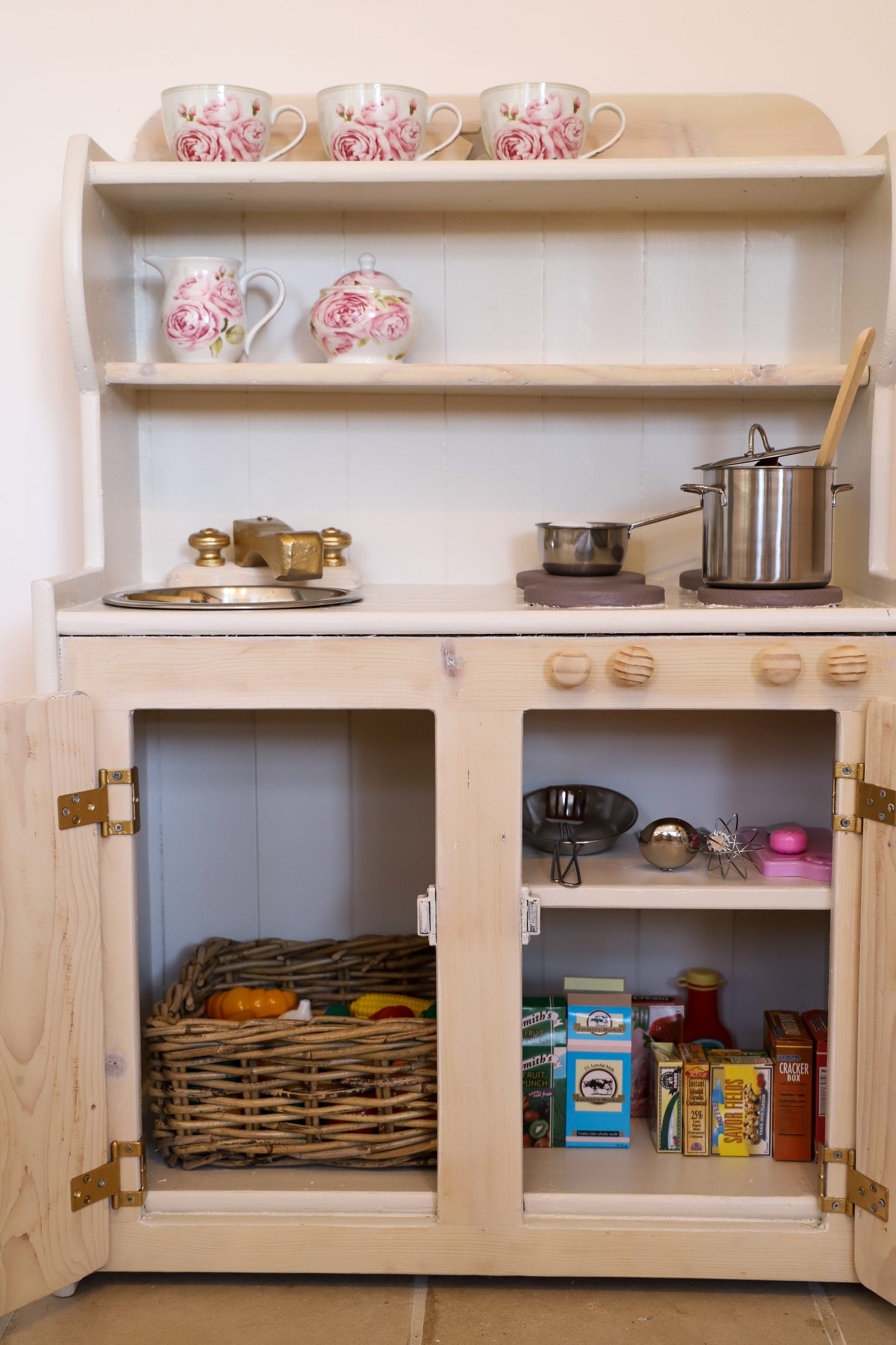 White washed wooden kids kitchen