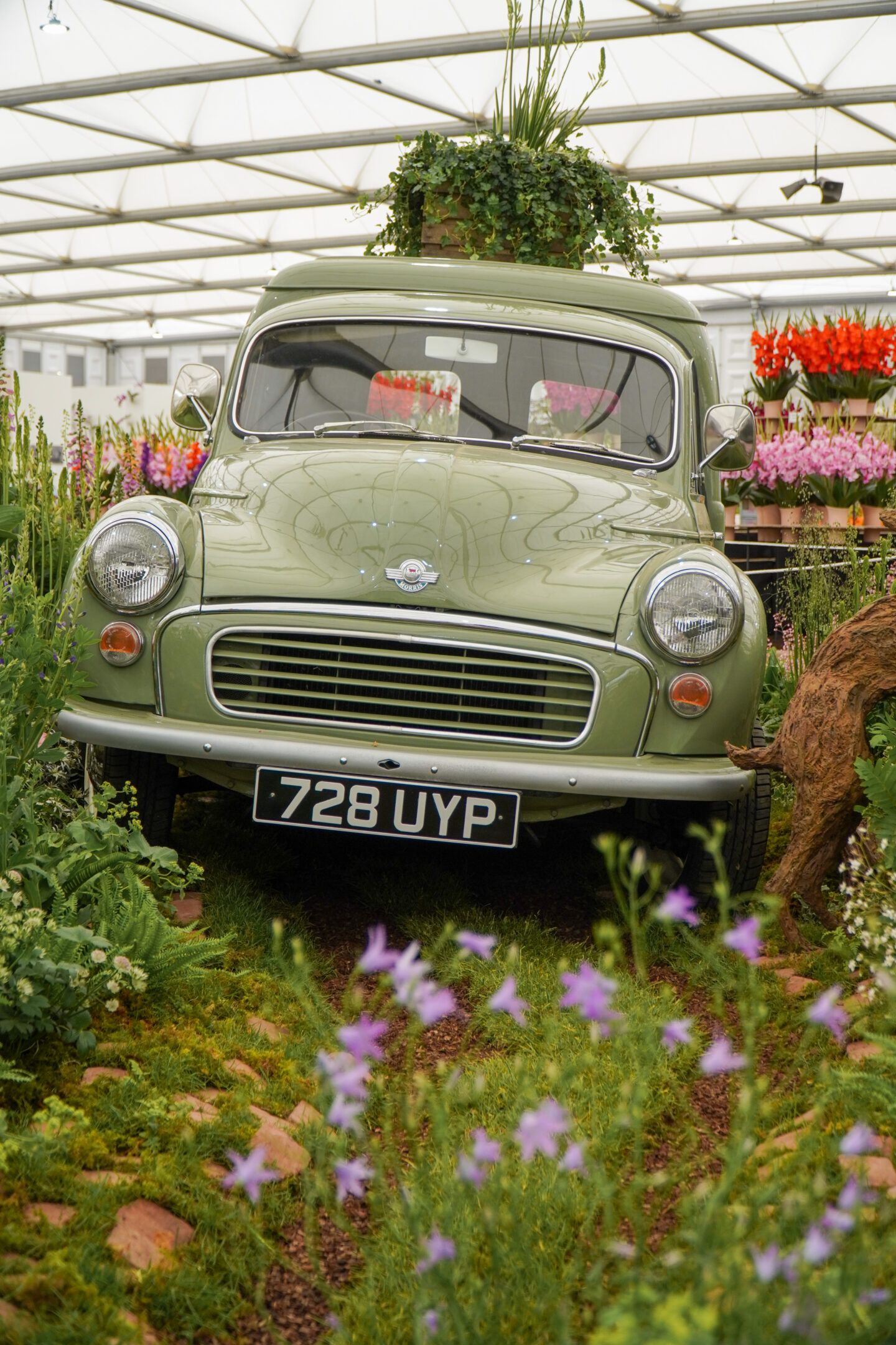 Green car in a floral display at the RHS Chelsea Flower show