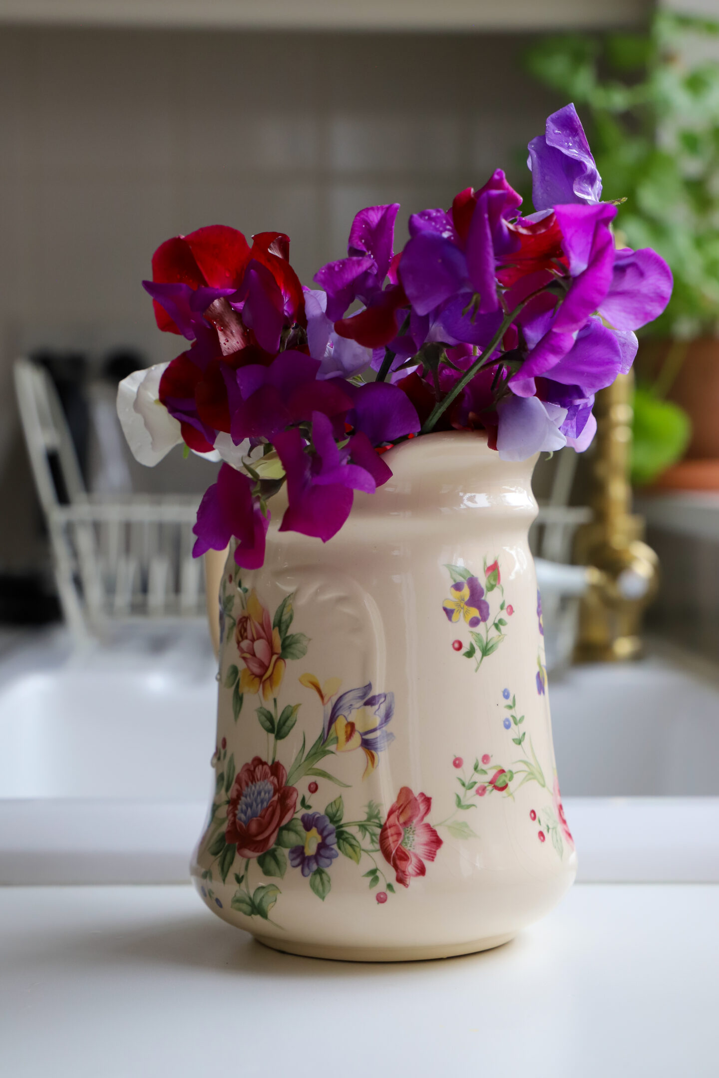 Sweet peas home grown in a floral vintage vase.